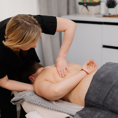 Масаж спини